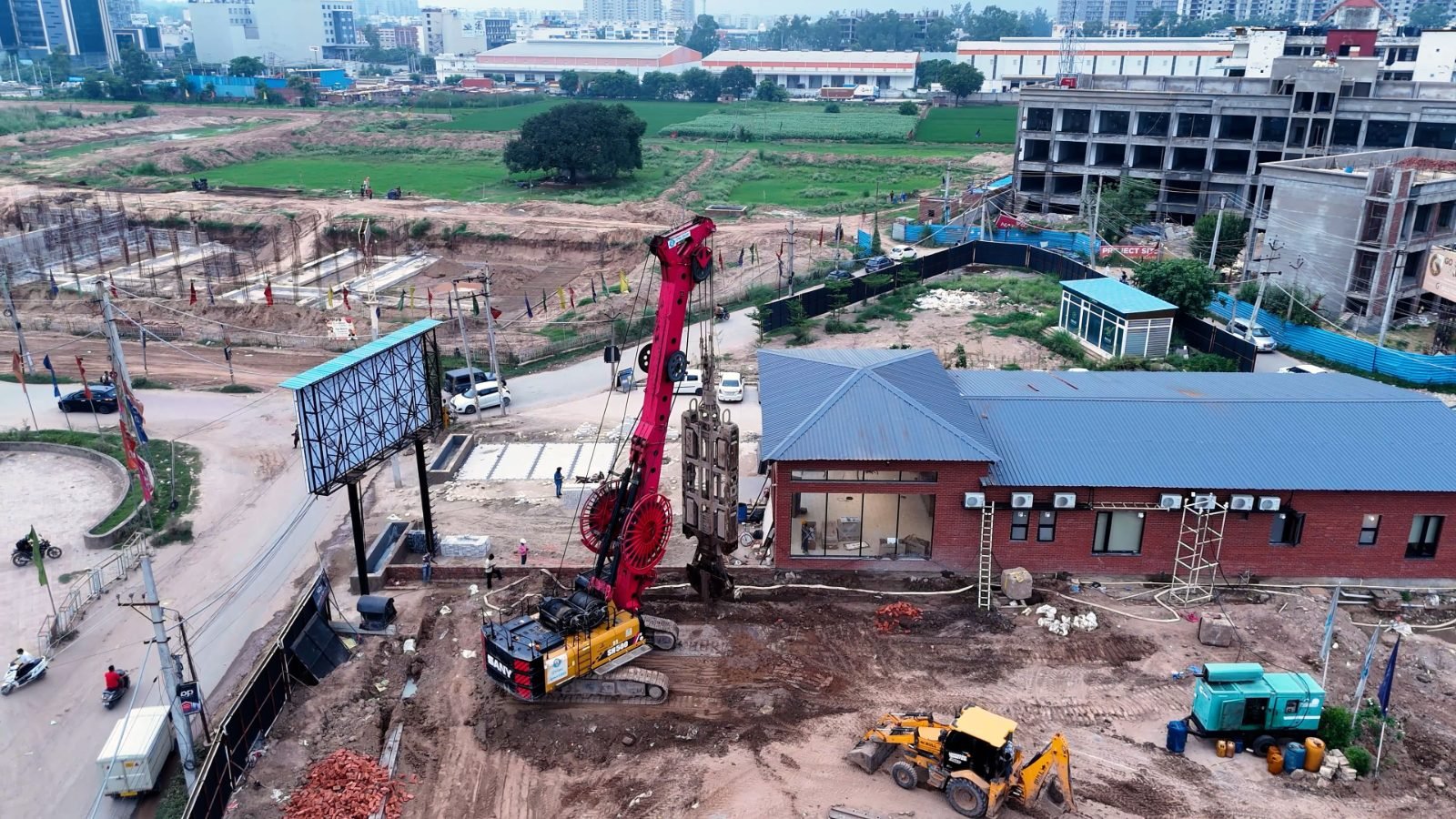 Rig, site office and hoarding on VIP Road
